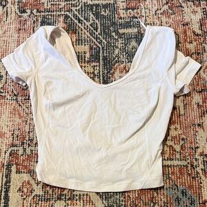 Lululemon Athletica Cream Bodysuit Top